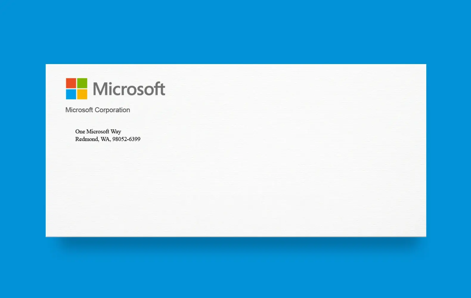An envelope branded with the Microsoft logo, name, and address.